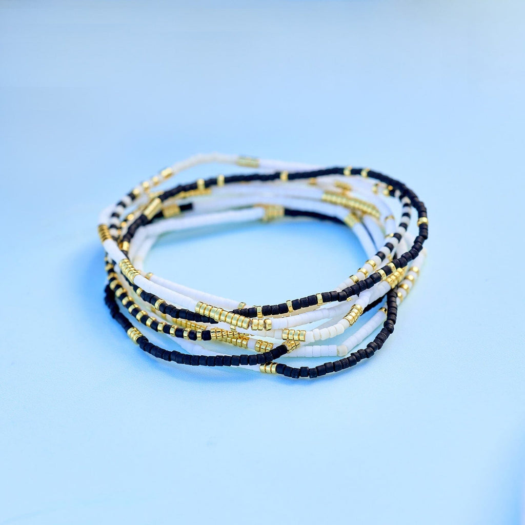 Lot de 8 bracelets extensibles monochromes