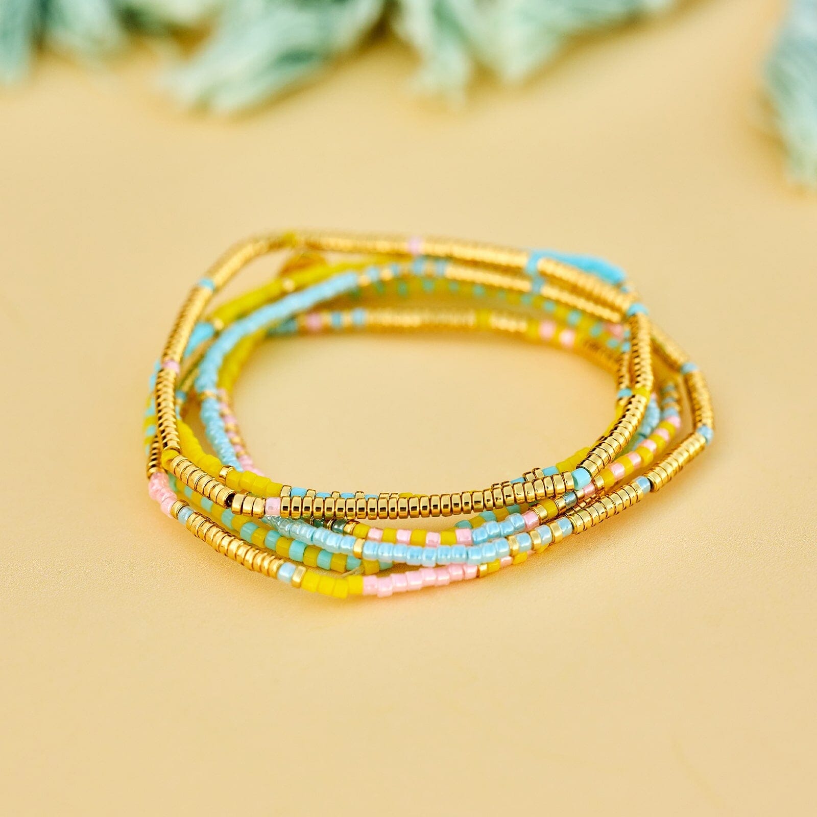 Ensemble de 8 bracelets extensibles perles mélangées Coucher de soleil sur la plage