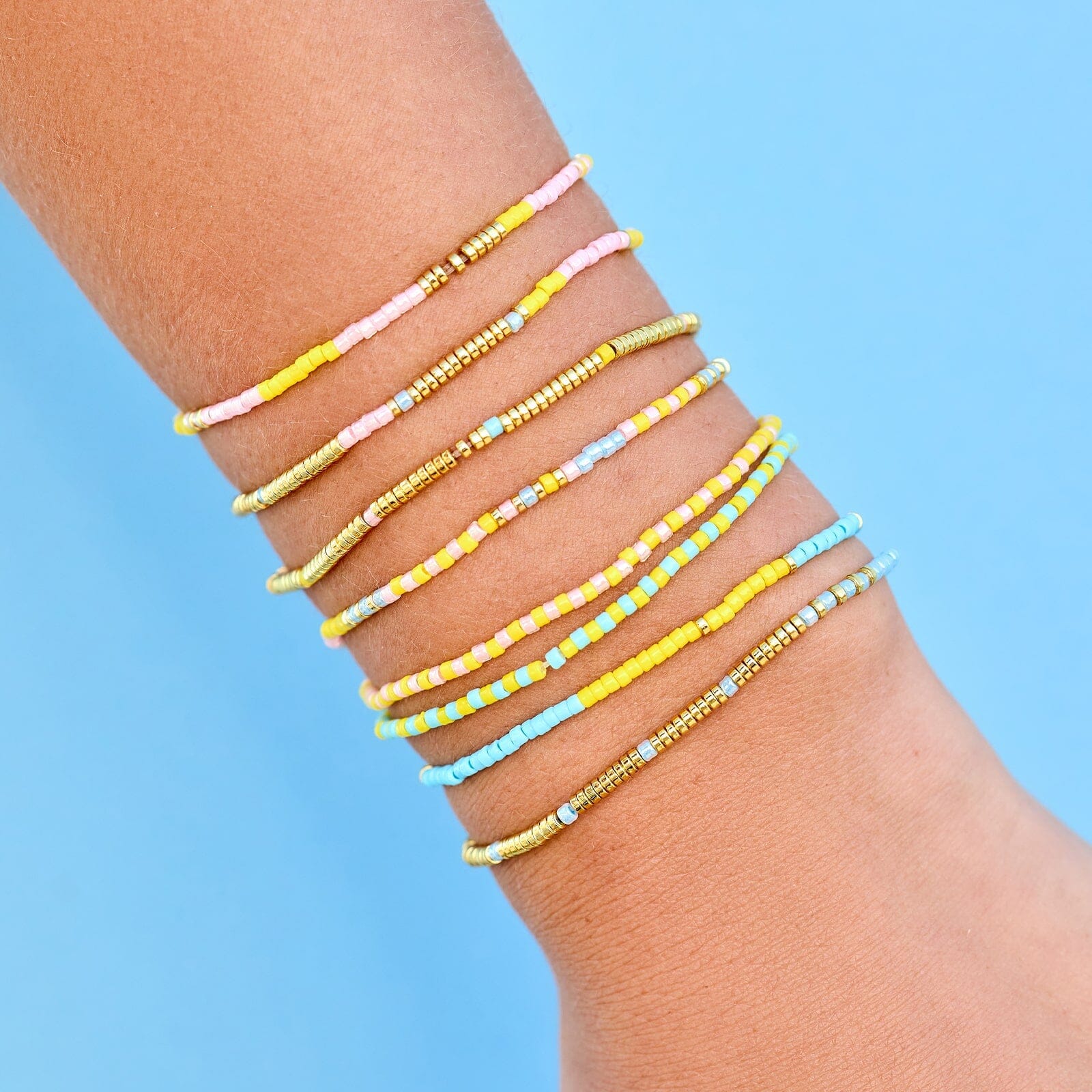 Ensemble de 8 bracelets extensibles perles mélangées Coucher de soleil sur la plage