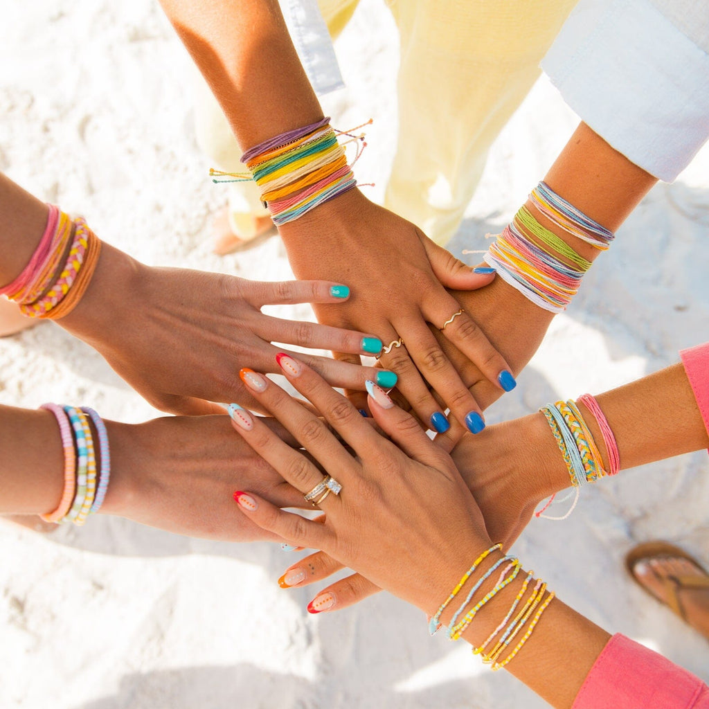Ensemble de 8 bracelets extensibles perles mélangées Coucher de soleil sur la plage