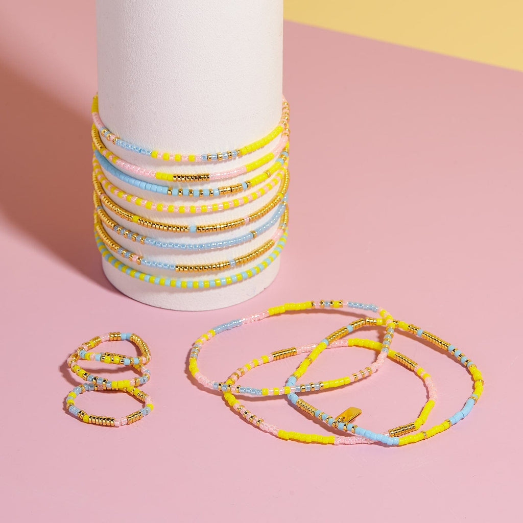 Ensemble de 8 bracelets extensibles perles mélangées Coucher de soleil sur la plage