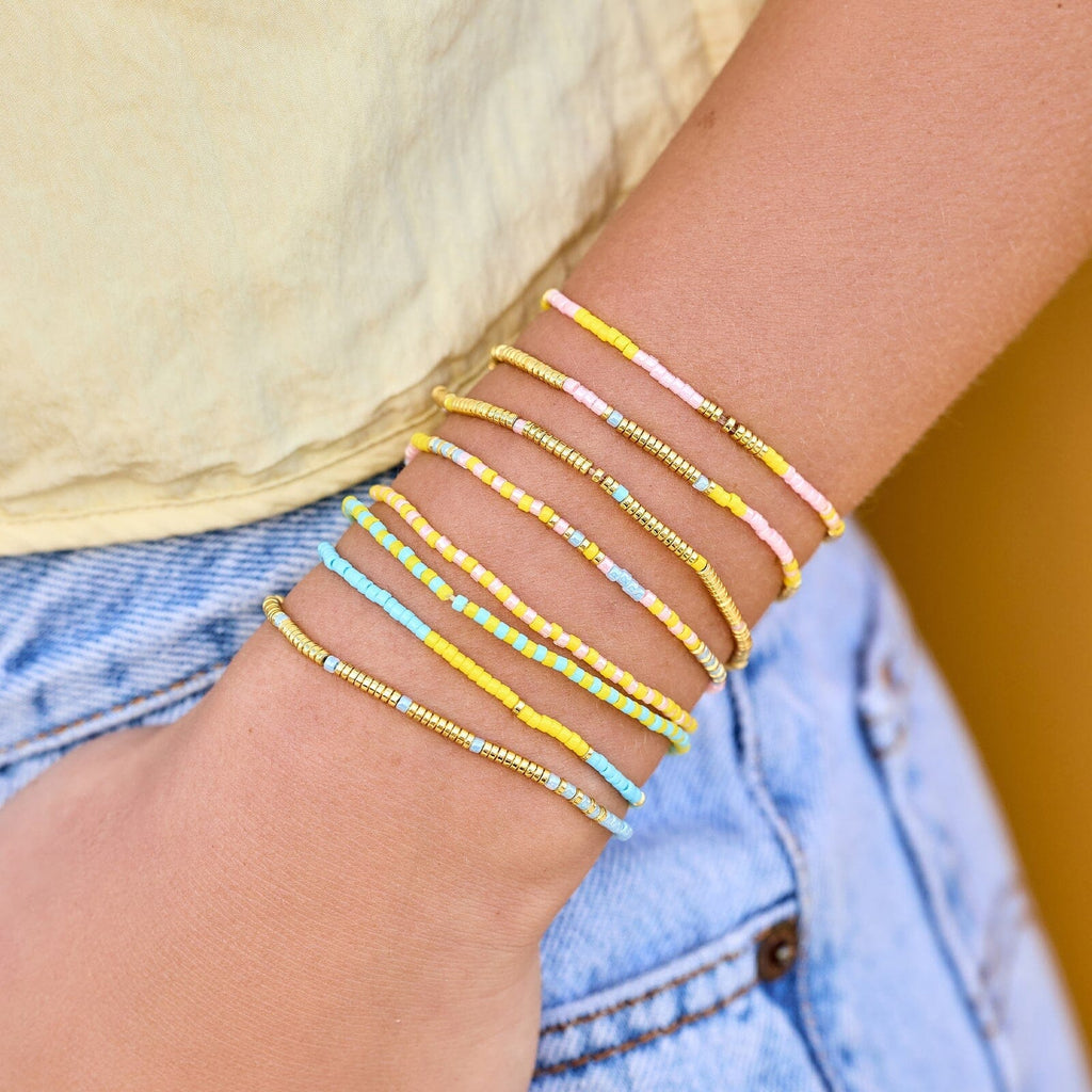 Ensemble de 8 bracelets extensibles perles mélangées Coucher de soleil sur la plage